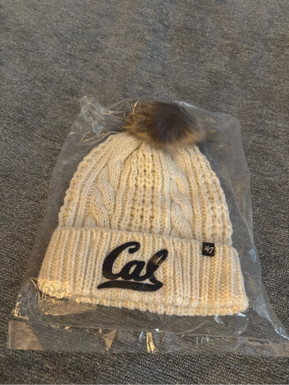 47 Cal Cable Knit Pom Beanie in Cream with Brown Pom